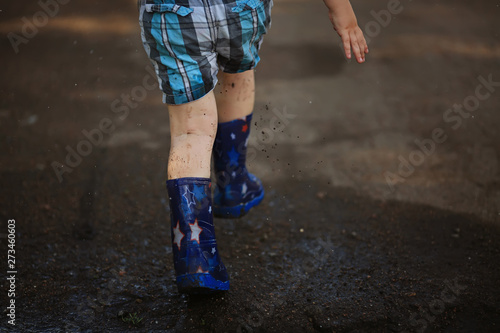 child and puddle