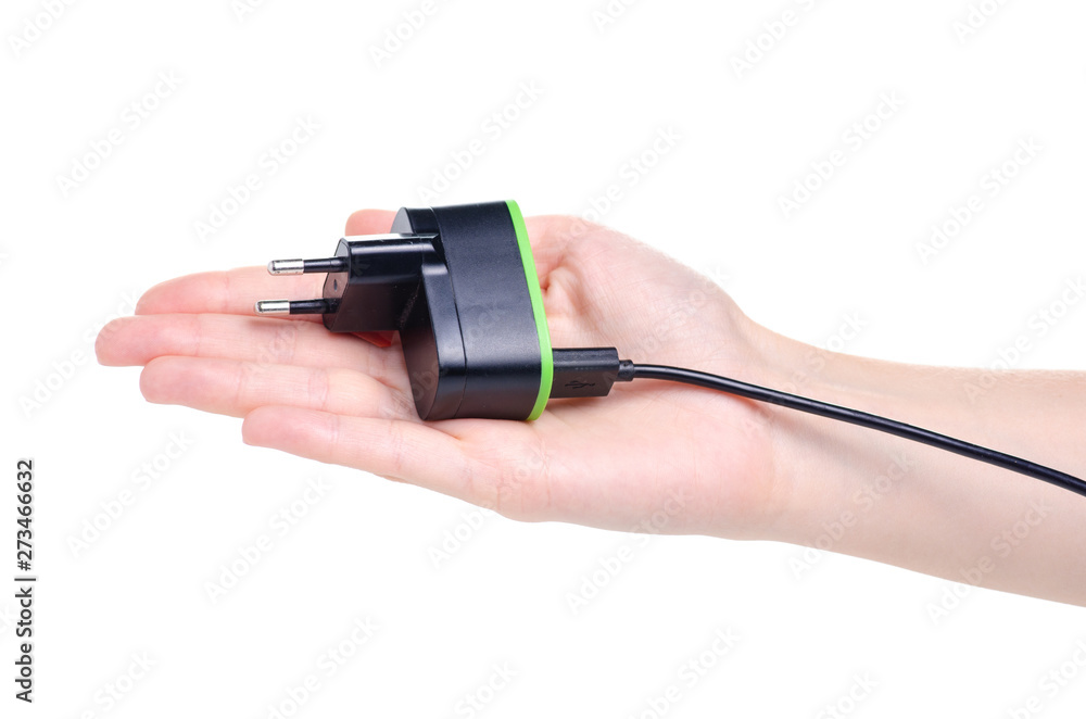 usb сharger in hand equipment on white background isolation usb сharger in hand equipment on white background isolation