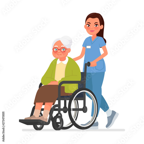 Nurse carries a grandmother in a wheelchair. Old woman in rehabilitation on a hospital. Caring for the elderly