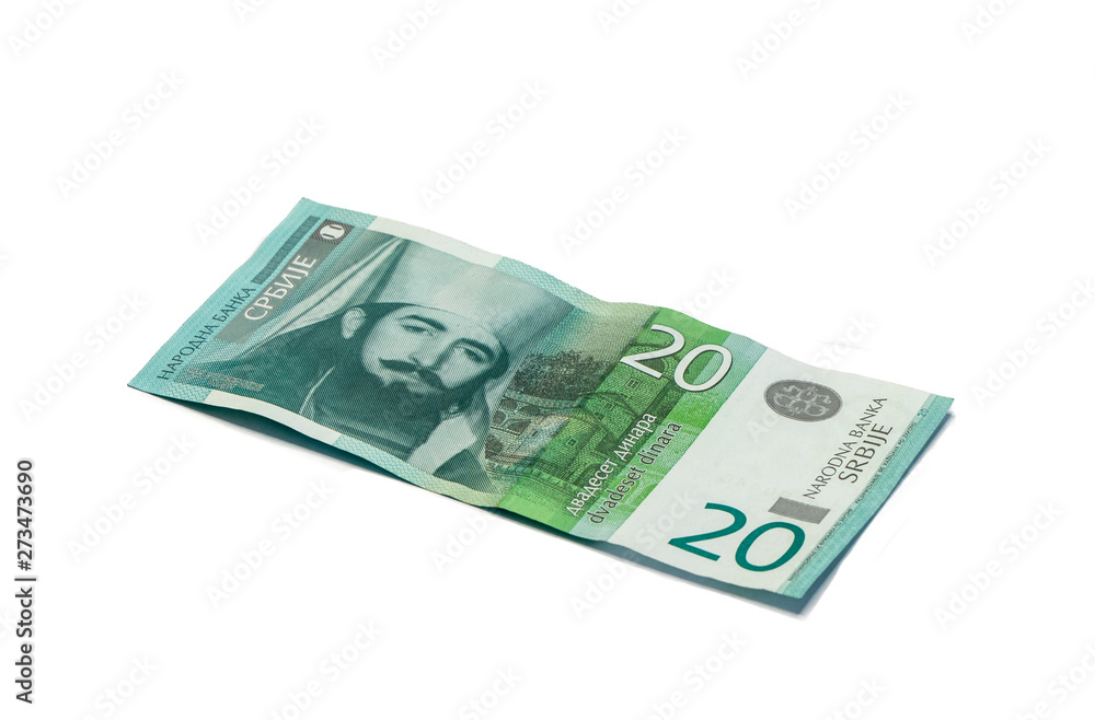 One banknote worth 20 Serbian Dinars with a portrait of the ruler of Montenegro Peter II Petrovich isolated on a white background One banknote worth 20 Serbian Dinars with a portrait of the ruler of Montenegro Peter II Petrovich isolated on a white background