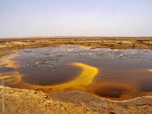 In the Danakilian depression of various fumaroles, steam emerges and water flows out. Ethiopia photo