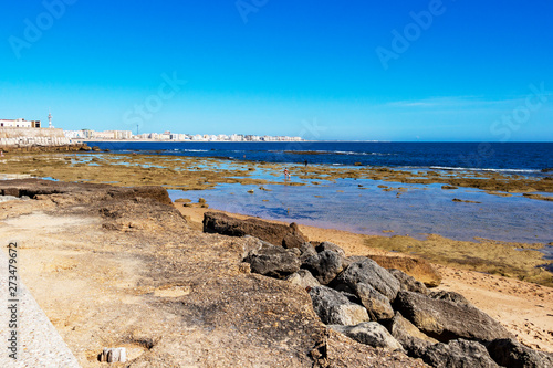 View of Cadiz and coastline, Province of Cadiz, Andalusia, Spain from the causeway to the Castle of San Sebastian © Stanislava