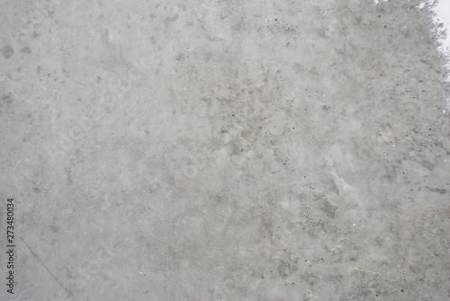 Close up of concrete wall with rough texture. Cement texture. © YanaKho