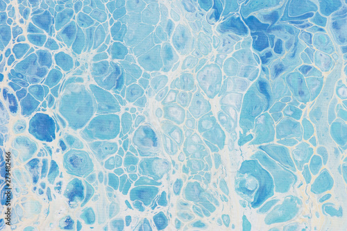 Beautiful background of liquid acrylic in blue and white on canvas