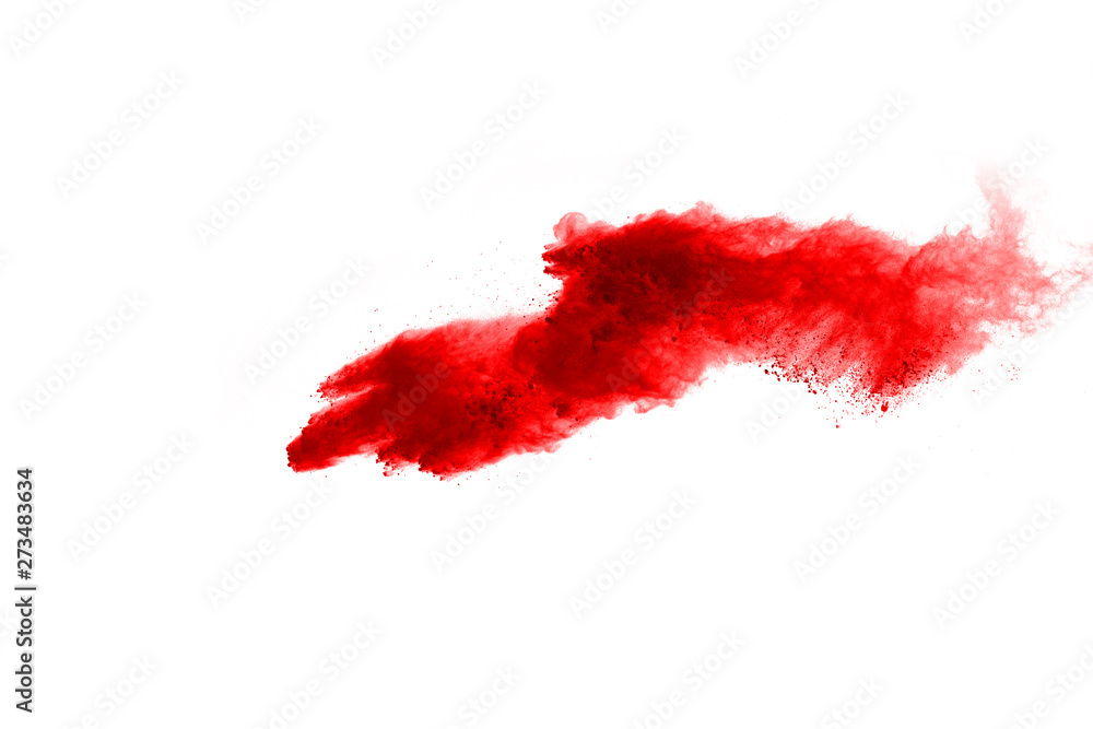 Freeze motion of red powder exploding, isolated on white background. Abstract design of red dust cloud. Freeze motion of red powder exploding, isolated on white background. Abstract design of red dust cloud.