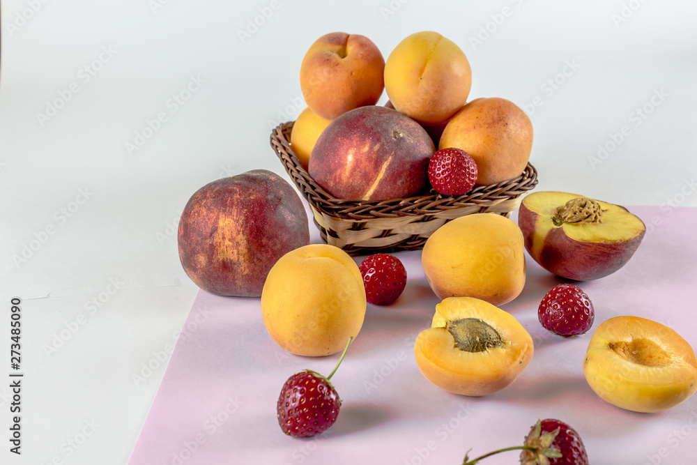 peach, apricot, strawberry, background for text, fruit on a light background peach, apricot, strawberry, background for text, fruit on a light background