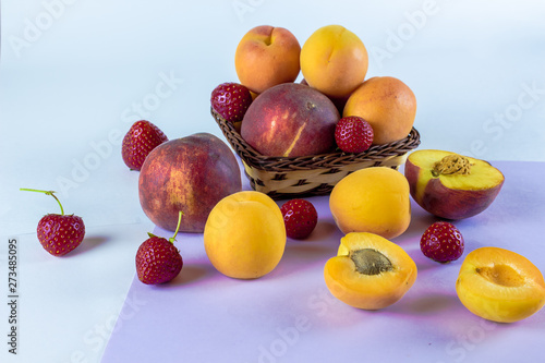 peach  apricot  strawberry  background for text  fruit on a light purple background