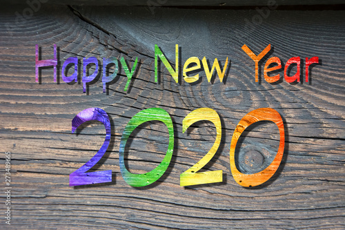 New Year 2020 - rainbow colored wishes. Concept of ecology and tolerance.