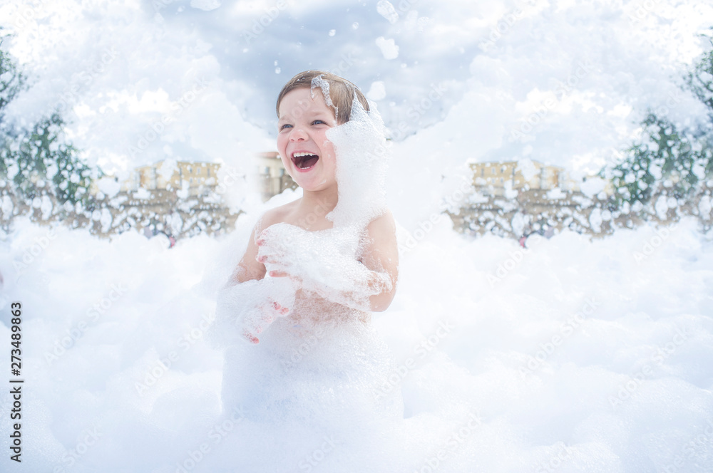3 years boy enjoying at foam party outdoors 3 years boy enjoying at foam party outdoors
