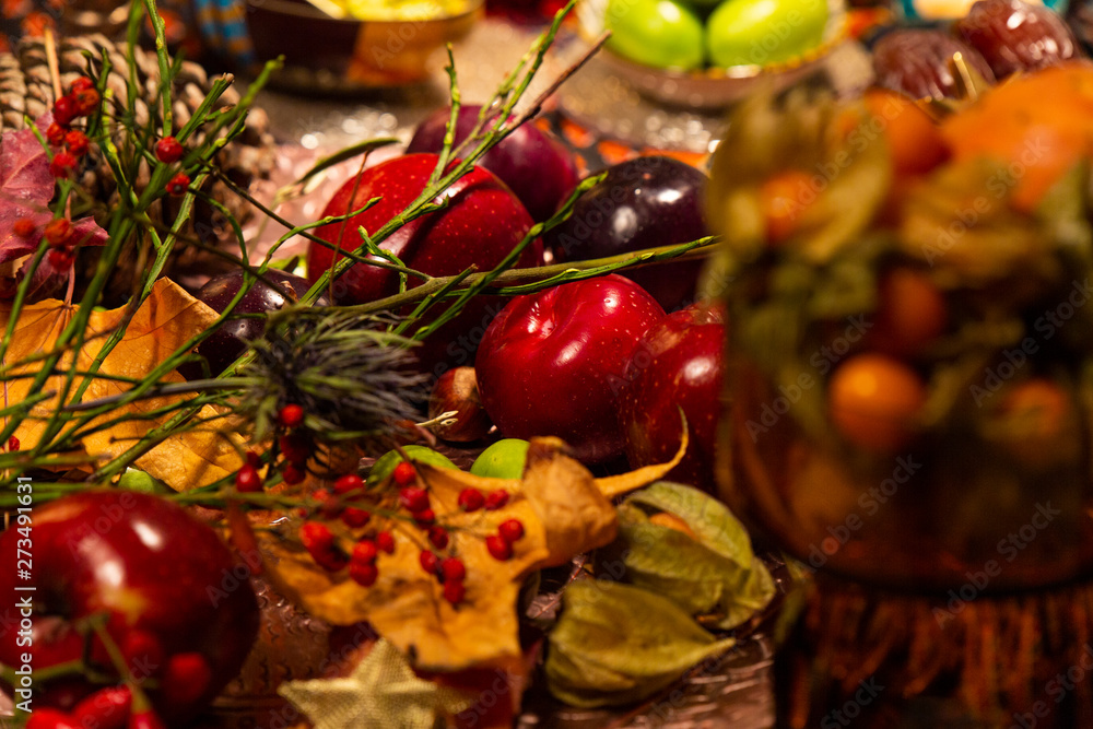 Close Up of Table decorated with Autumn and Winter Fruits and Edibles Close Up of Table decorated with Autumn and Winter Fruits and Edibles