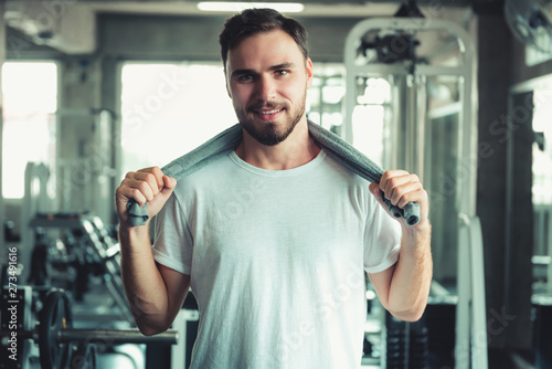 Portrait of Handsome Man is Exercising in Fitness Club.,Portrait of Strong Man Doing Working Out Calories Burning in Gym., Healthy and Fitness Exercise Lifestyle Concept.