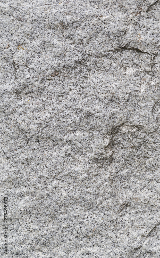 Close-up of white, fine-grained granite surface. High resolution full frame texture background. Close-up of white, fine-grained granite surface. High resolution full frame texture background.