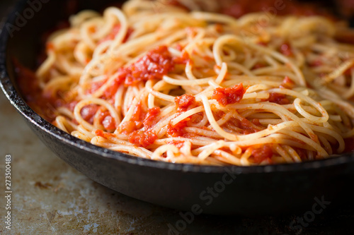 rustic italian spaghetti pasta in tomato sauce