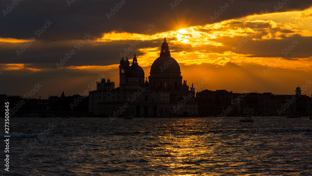 Beautiful sunset over Venice Lagoon and Saint Mary of the Health Basilica
