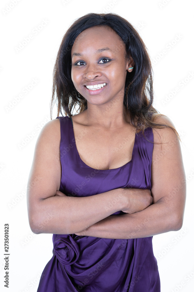 Beautiful african young woman smiling posing with crossed arms Beautiful african young woman smiling posing with crossed arms
