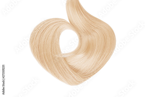 Blond hair isolated on white background. Heart shape