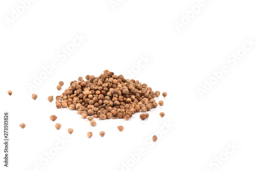 Coriander seeds are isolated on a white background.