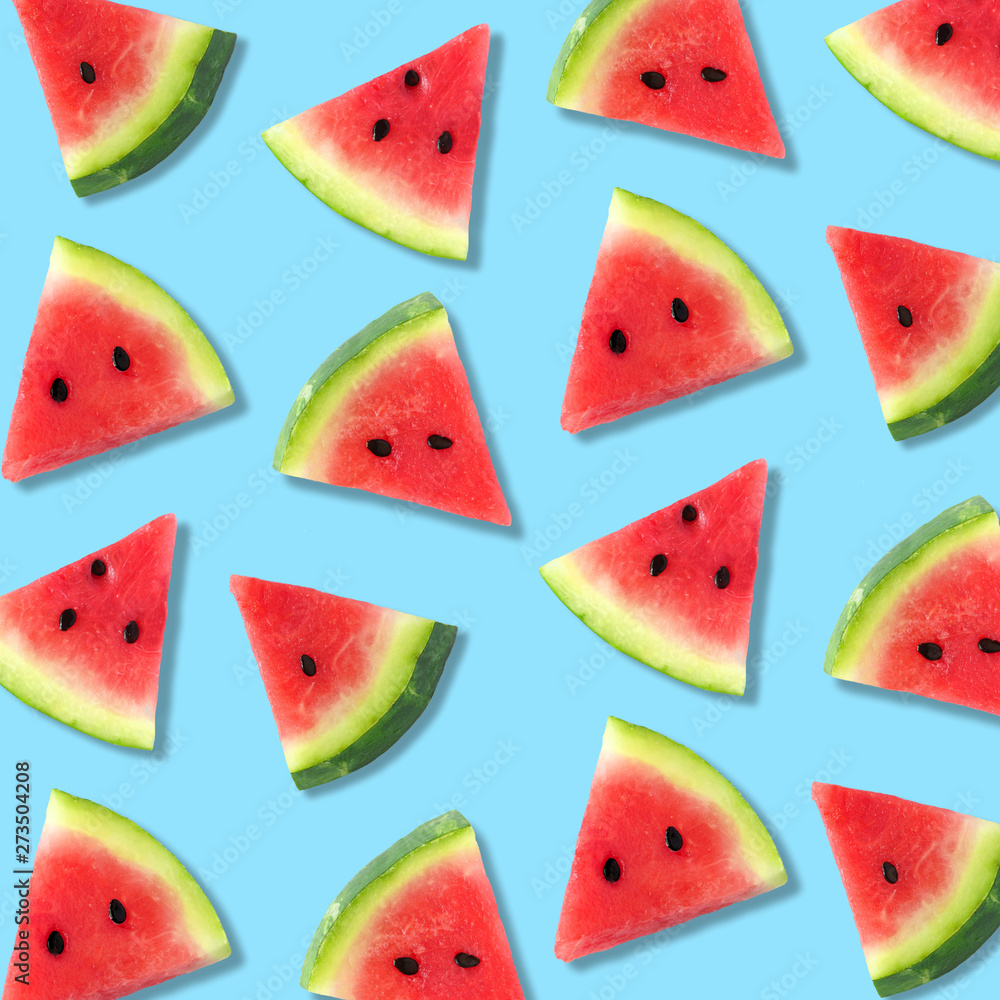 Colorful summer fruit pattern of watermelon slices on a pastel blue ...