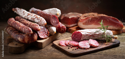 Photos Various kind types of salami, speck and sausages