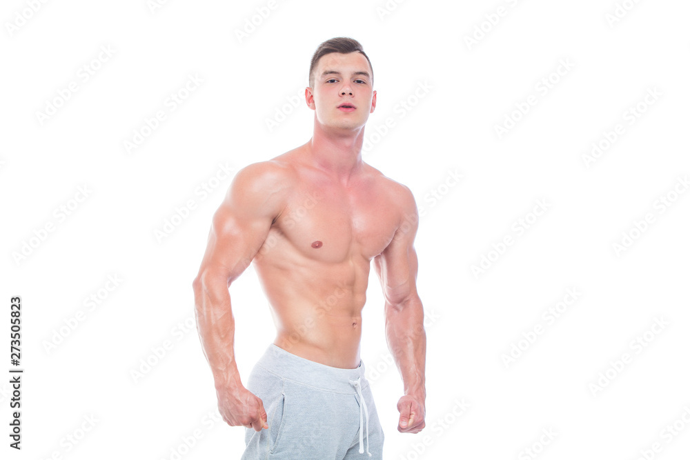 Fototapeta premium Strong Athletic Man Fitness Model Torso showing six pack abs. isolated on white background with copyspace