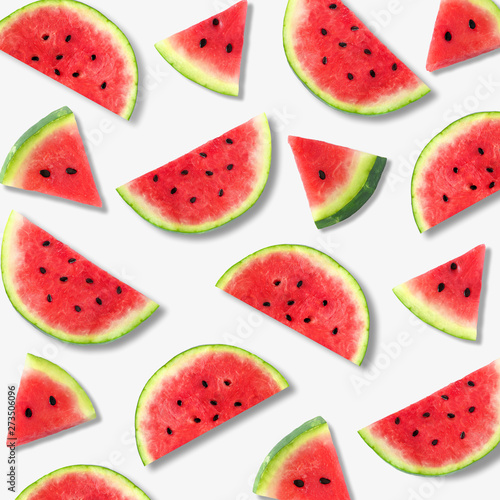 Fototapeta Naklejka Na Ścianę i Meble -  Colorful summer fruit pattern of watermelon slices on a white background
