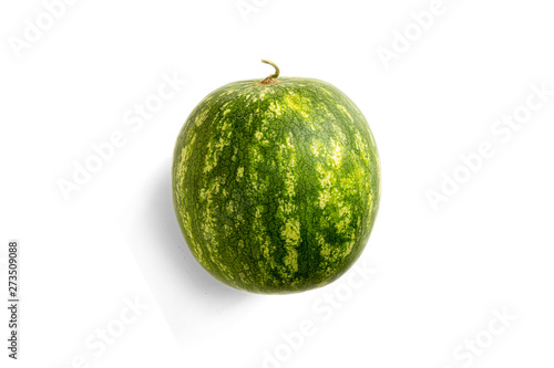 Watermelon isolated on a white background. Natural light and shadows