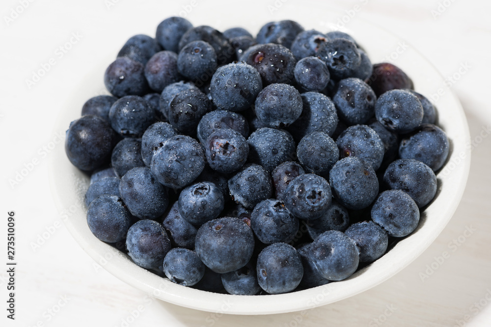 fresh farm blueberries on white background, closeup fresh farm blueberries on white background, closeup