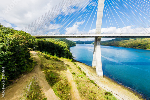 View of a cable-stayed bridge Pont de Terenez in France on a sunny summer day photo