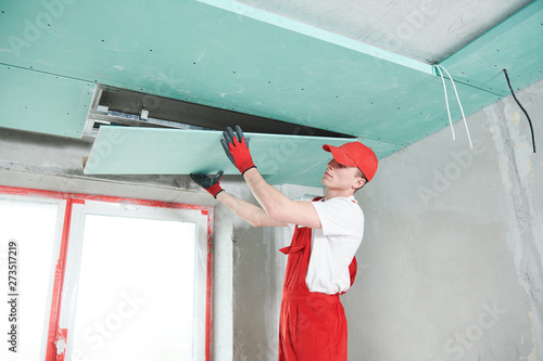 Φωτογραφία gypsum plasterboard construction work at suspended ceiling