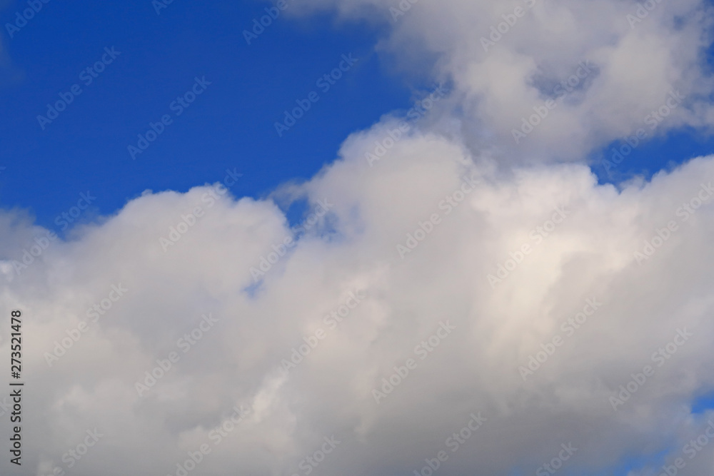 A large cloud in a blue sky