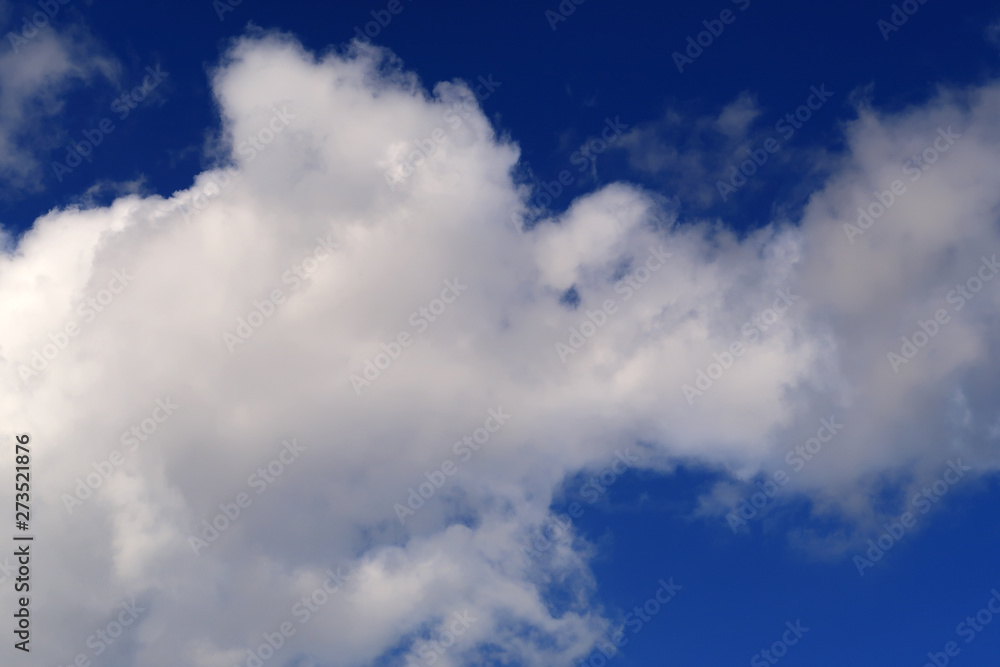Large clouds in a deep blue sky Large clouds in a deep blue sky