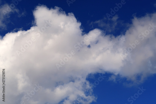 Large clouds in a deep blue sky