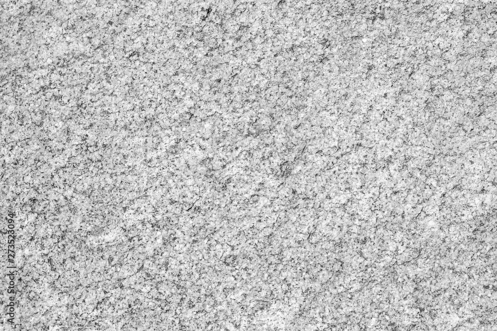 Texture of natural stone. Background natural stone granite gray. Rough texture. Texture of natural stone. Background natural stone granite gray. Rough texture.