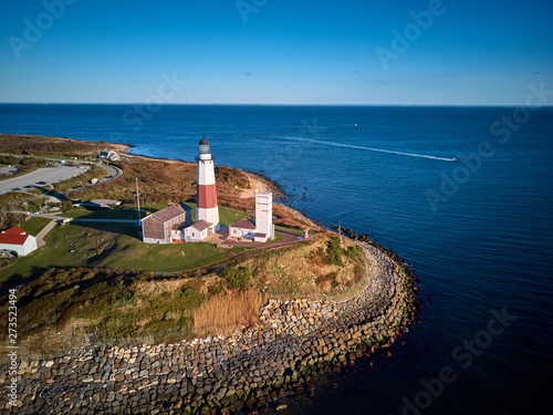 Montauk Lighthouse and beach aerial shot, Long Island, New York, USA.