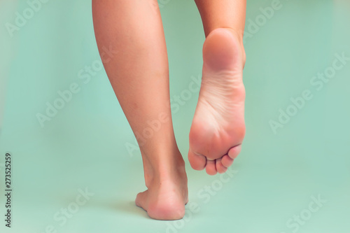 Woman's foot. People, healthcare and medicine concept