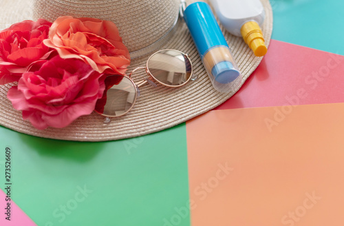 summer layout - hat, sunglasses and sunscreen