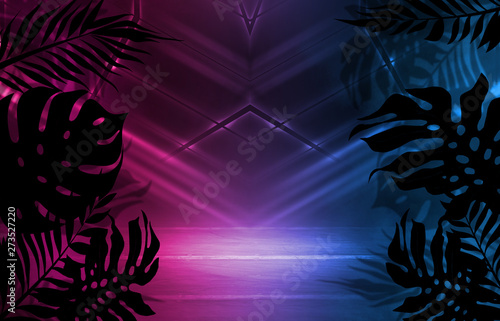 Background of empty dark scenes with neon lights and shapes  smoke. Silhouettes of tropical palm leaves in the foreground. Bright futuristic abstract background