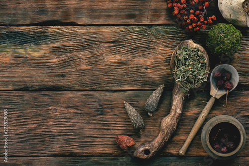 Fotografija Witch doctor table with various dried ingridients above