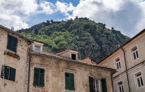 Green shutters on house in streets of old town Kotor in Montenegro © steheap