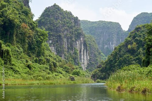 Nature, landscape with karst mountains and river, Ninh Binh, Trang An, Vietnam.