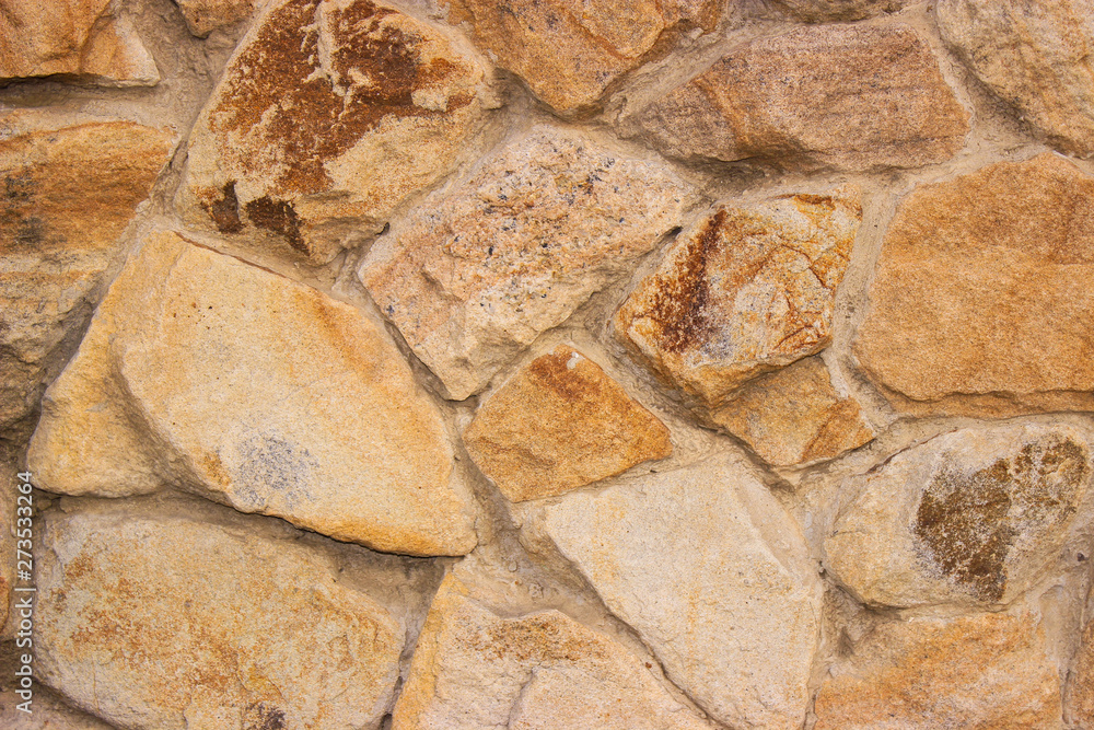 Decorative stonework light brown. Good background for photo wallpapers. Decorative stonework light brown. Good background for photo wallpapers.