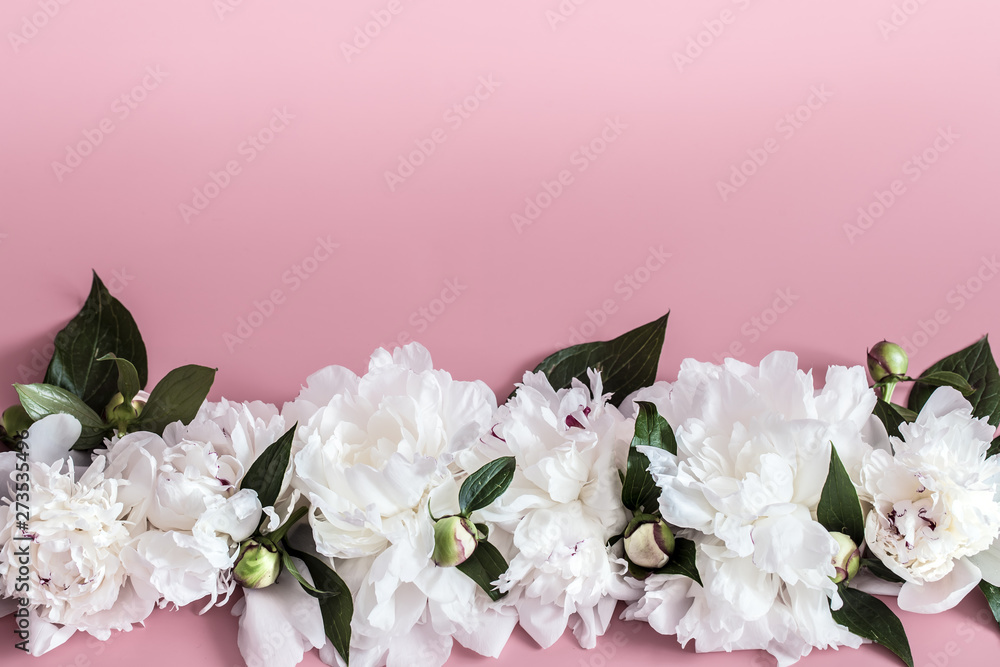Fototapeta premium Design concept - top view of bunch of beautiful flowers on colored background with copy space