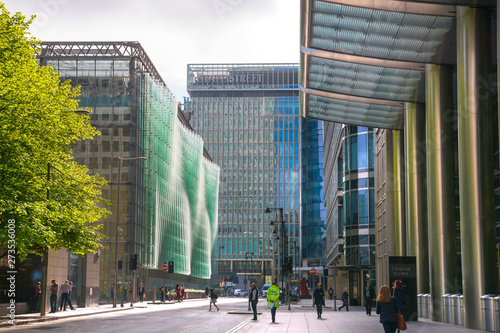 Canary Wharf Street View London, Uk. Canary Wharf Bank Street View With People And Cars On The Road  Stock Photo | Adobe Stock