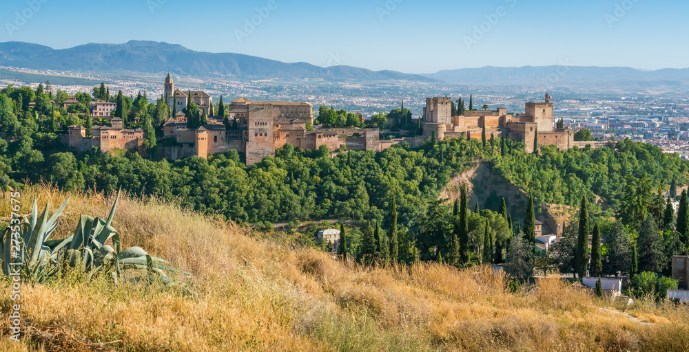 Panoramic sight of the Alhambra Palace in Granada in the late afternoon sun. Andalusia, Spain.