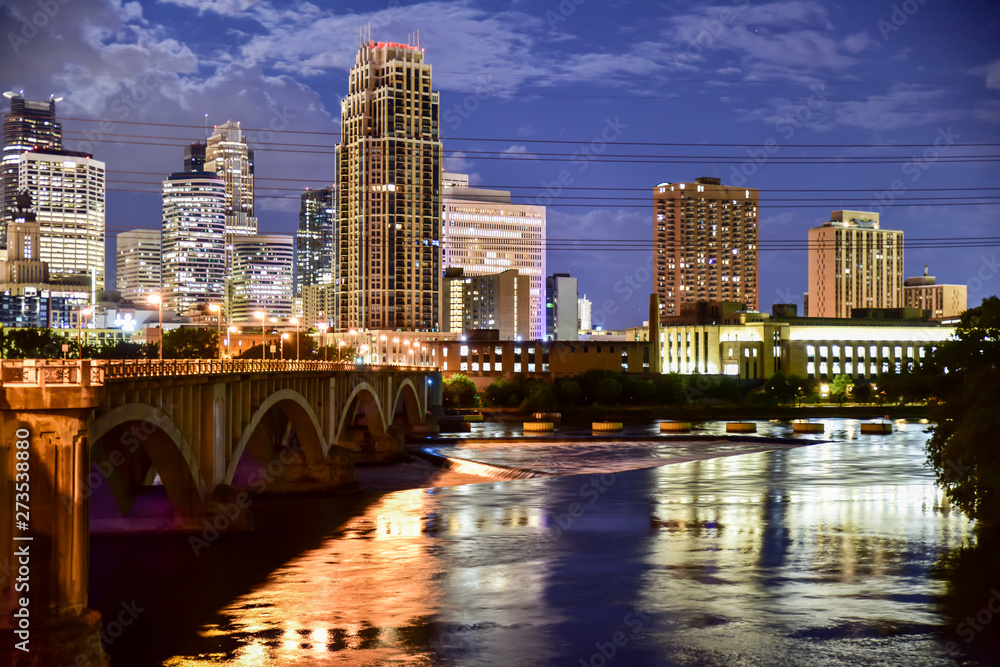 Fototapeta premium urban skyline along the river at night