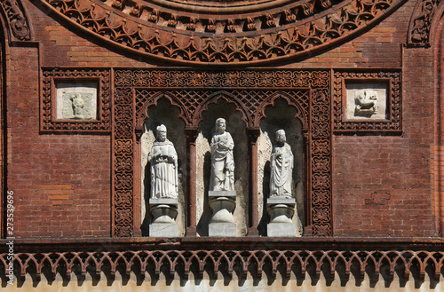 San Marco e due Santi Vescovi; facciata della chiesa di San Marco a Milano photo