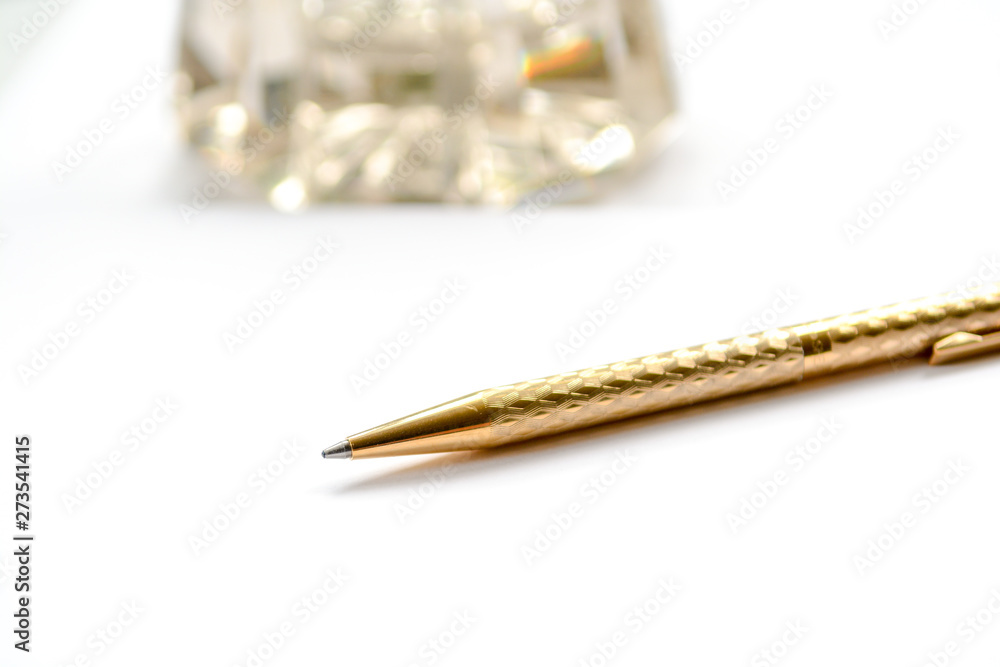 Pen and paper on table with blank page ready to write a letter Pen and paper on table with blank page ready to write a letter