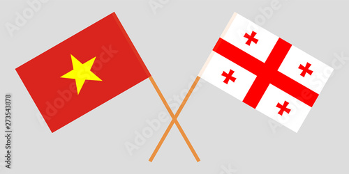 Georgia and Vietnam. Crossed Georgian and Vietnamese flags