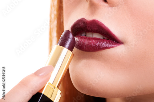 Mouth with dark red lipstick