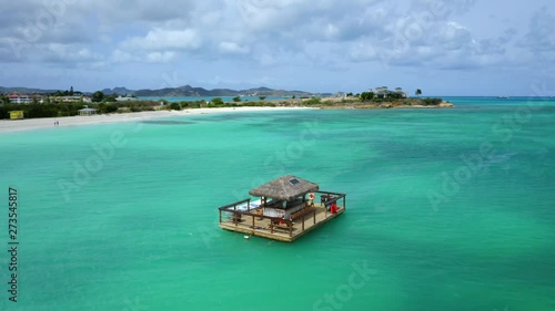 floating bar in Dickenson Bay, Anigua, Barbuda photo